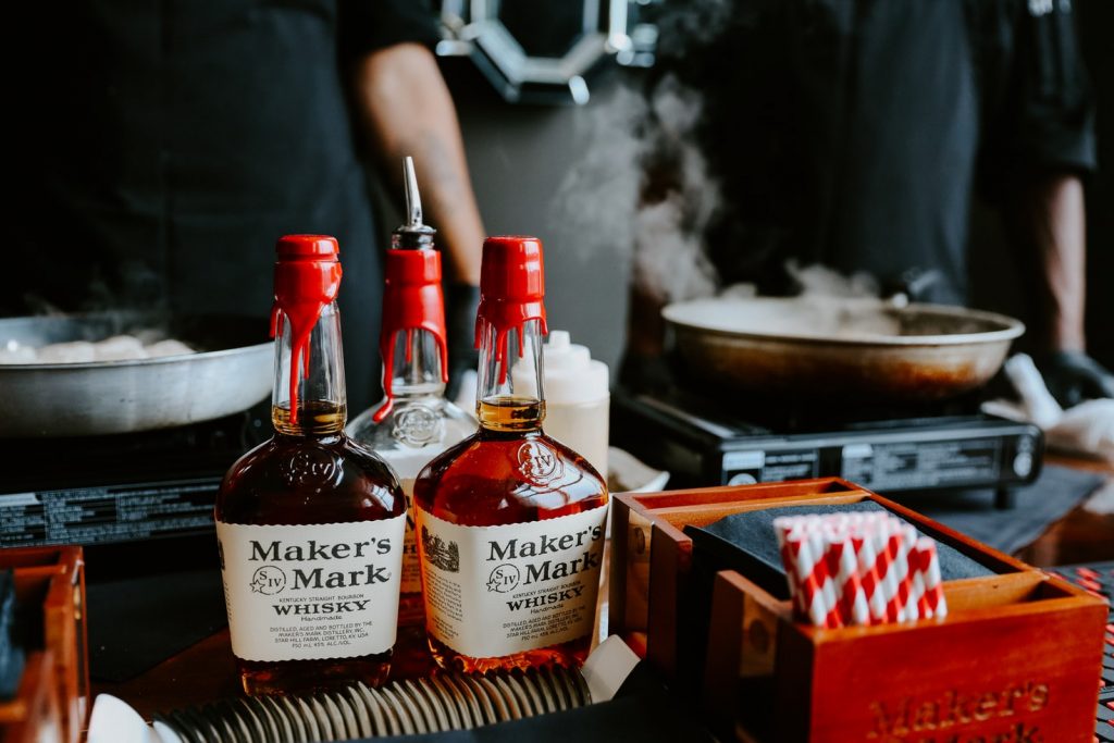 Maker's Mark (pictured) goes well with a spicy cigar. 