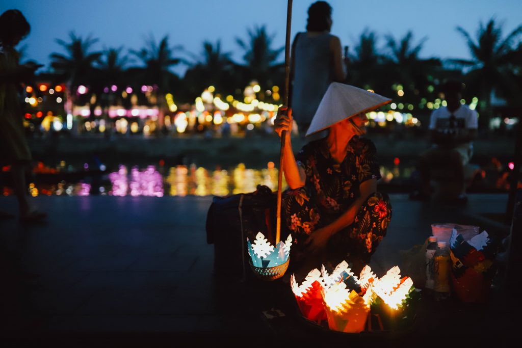 A women selling floating lanterns in Hoi An, Central Vietnam. 