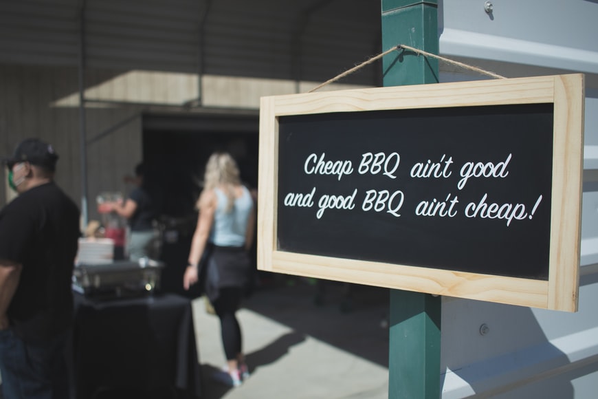 A sign which says "Cheap BBQ ain't good and good BBQ ain't cheap!"