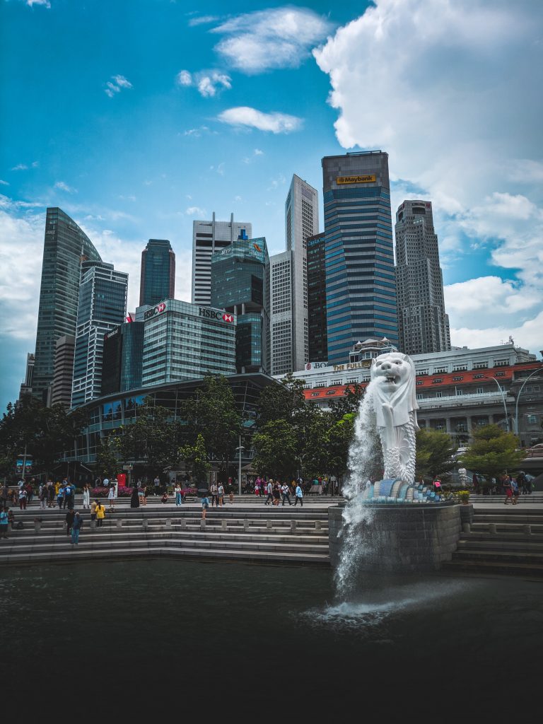 The famous Lion fountain in front of the Singapore skyline. 
