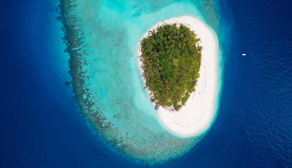 An aerial view of a small island in The Maldives. 