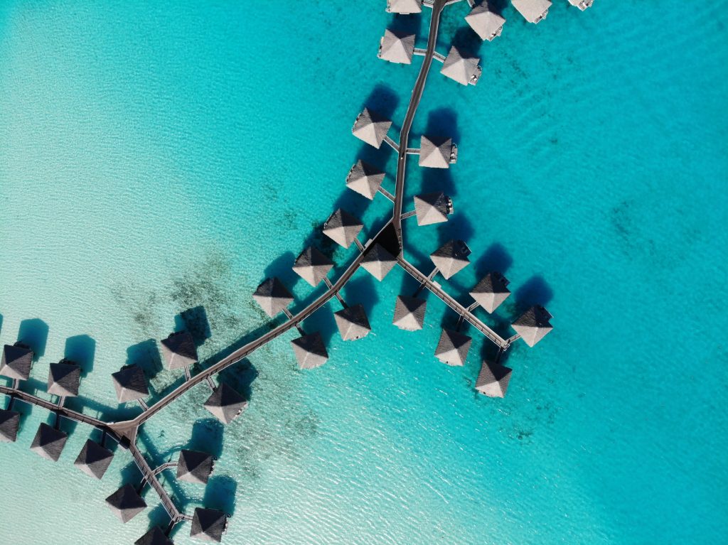 Overwater accommodation from the air in Bora Bora.
